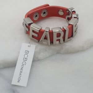 ✔️NWT BCBGeneration Orange Leather with Silver "Fearless" Text on snap Bracelet